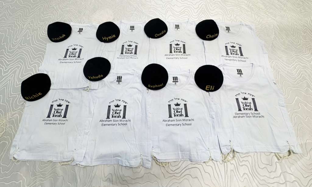Custom school tzitzit with matching embroidered name kippot