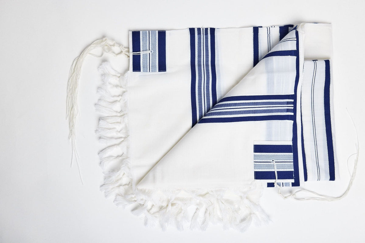 Modim classic wool tallit with royal blue stripes, folded