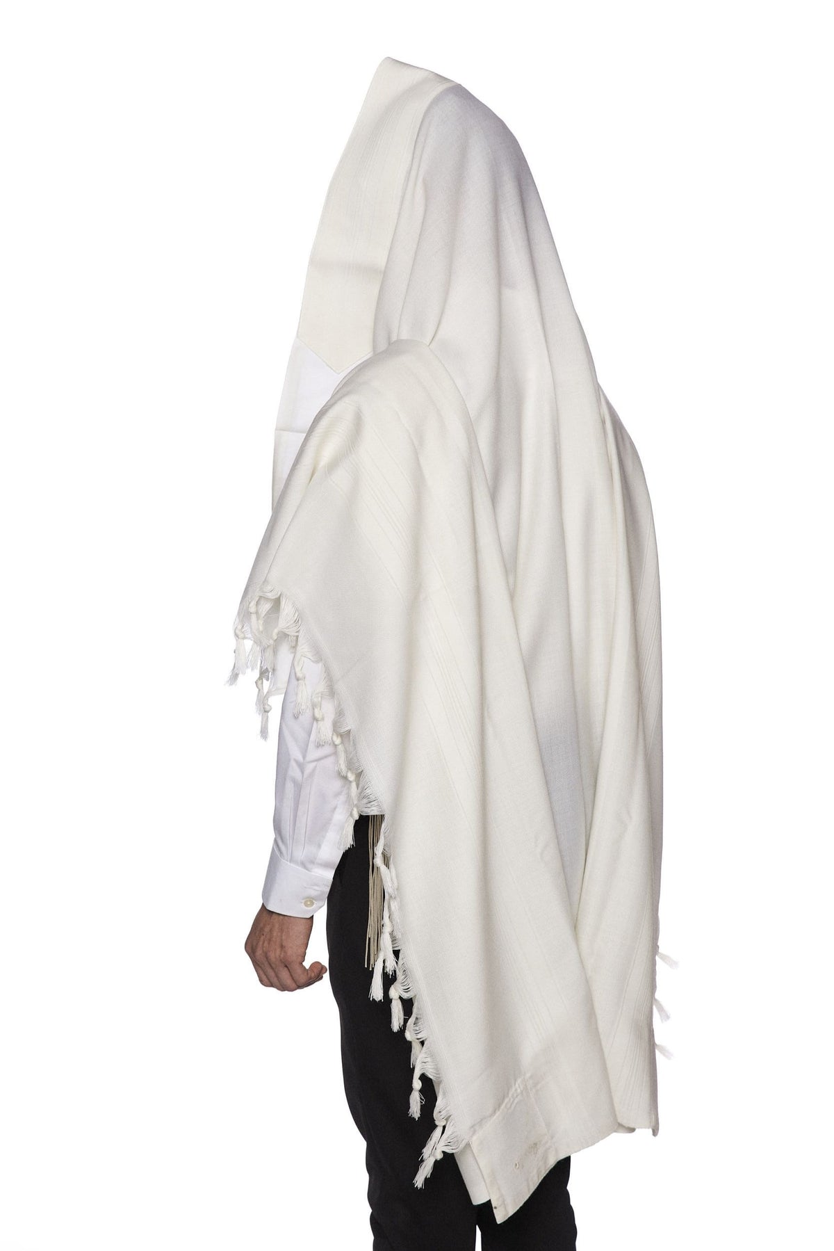 Man wearing Yishtabach non-slip wool tallit with white Beit Yosef stripes