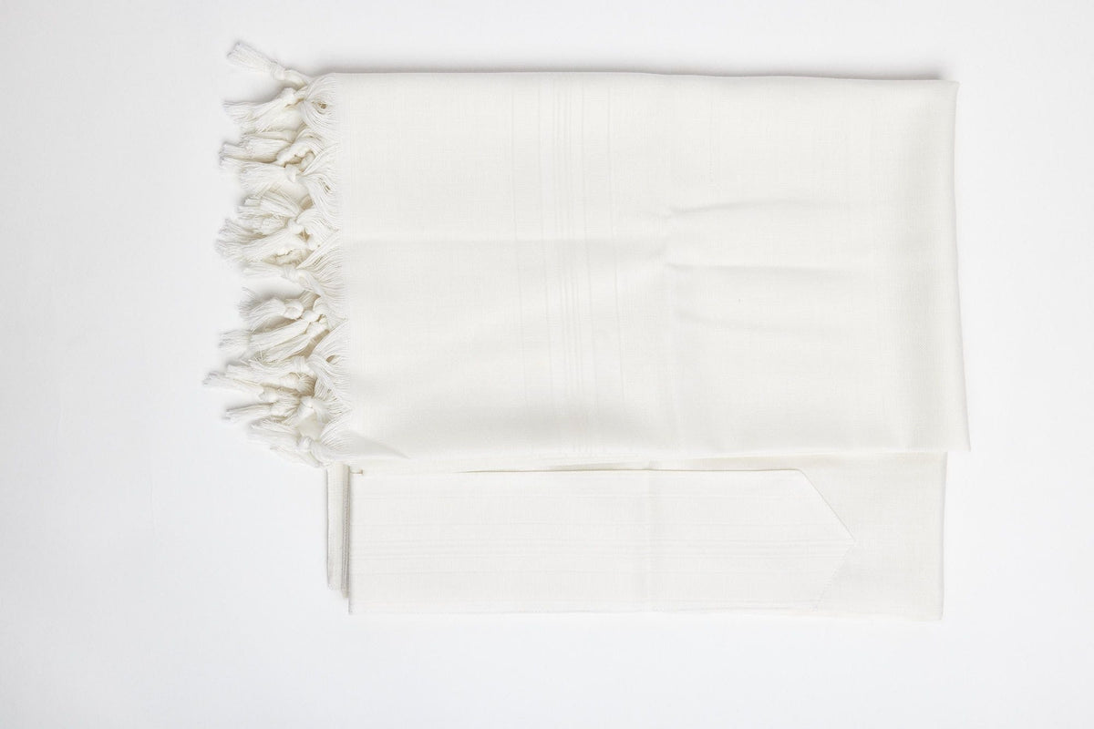 Yishtabach non-slip wool tallit with white Beit Yosef stripes, folded